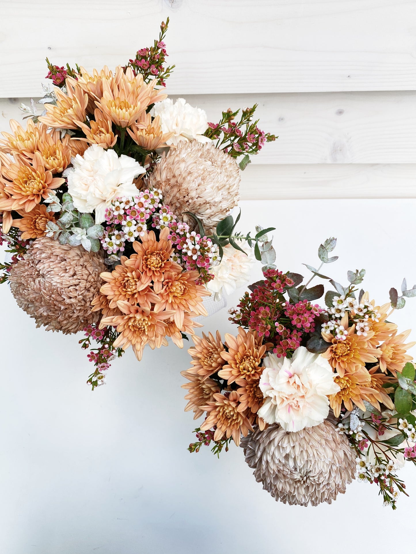 mini flowers in a hat box